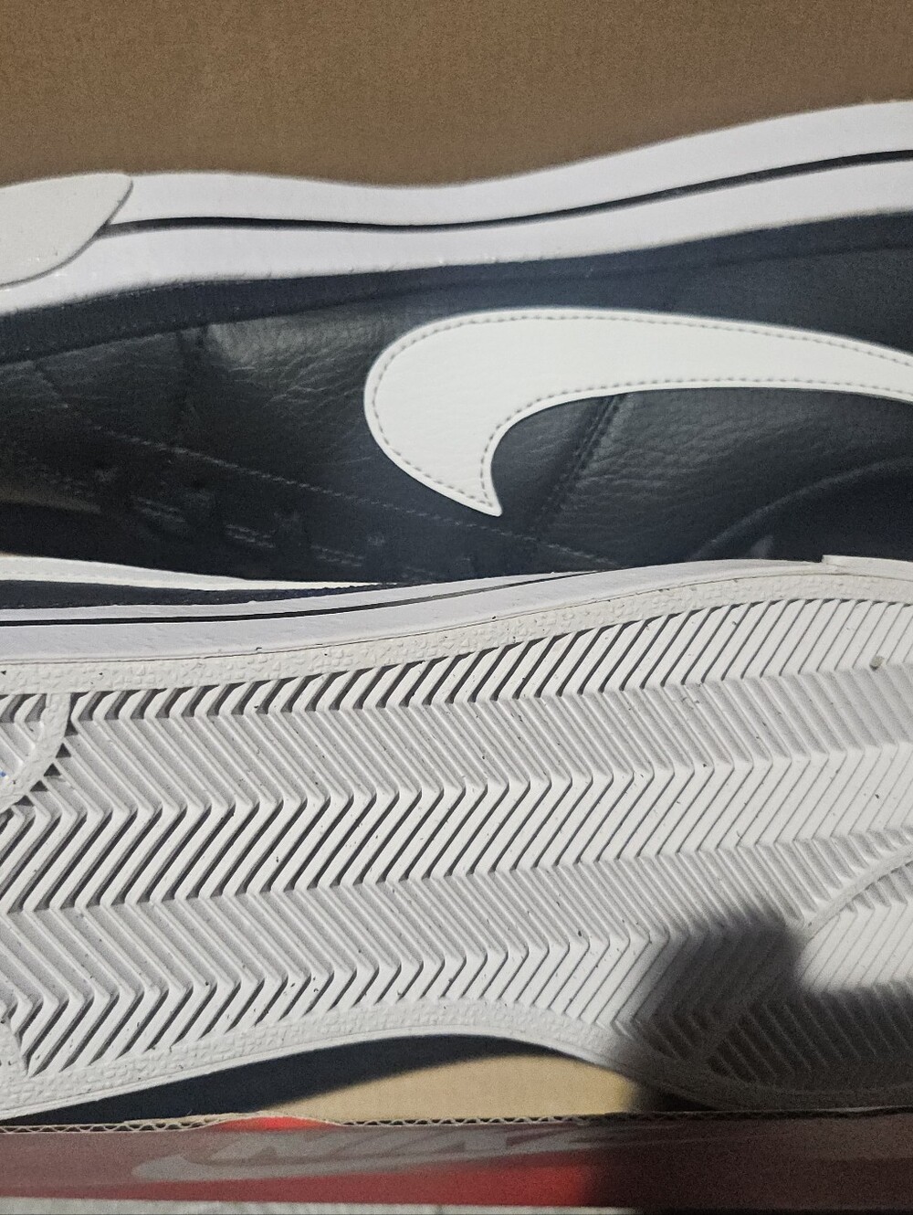 Nike Men's Black Leather Sneakers with White Swoosh